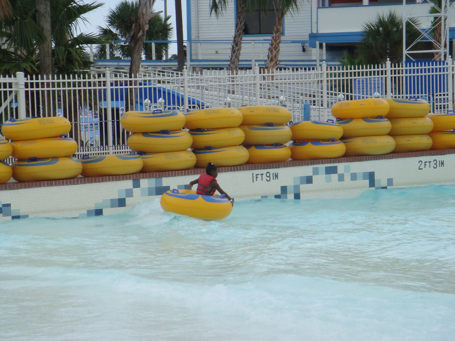 girl in pool float