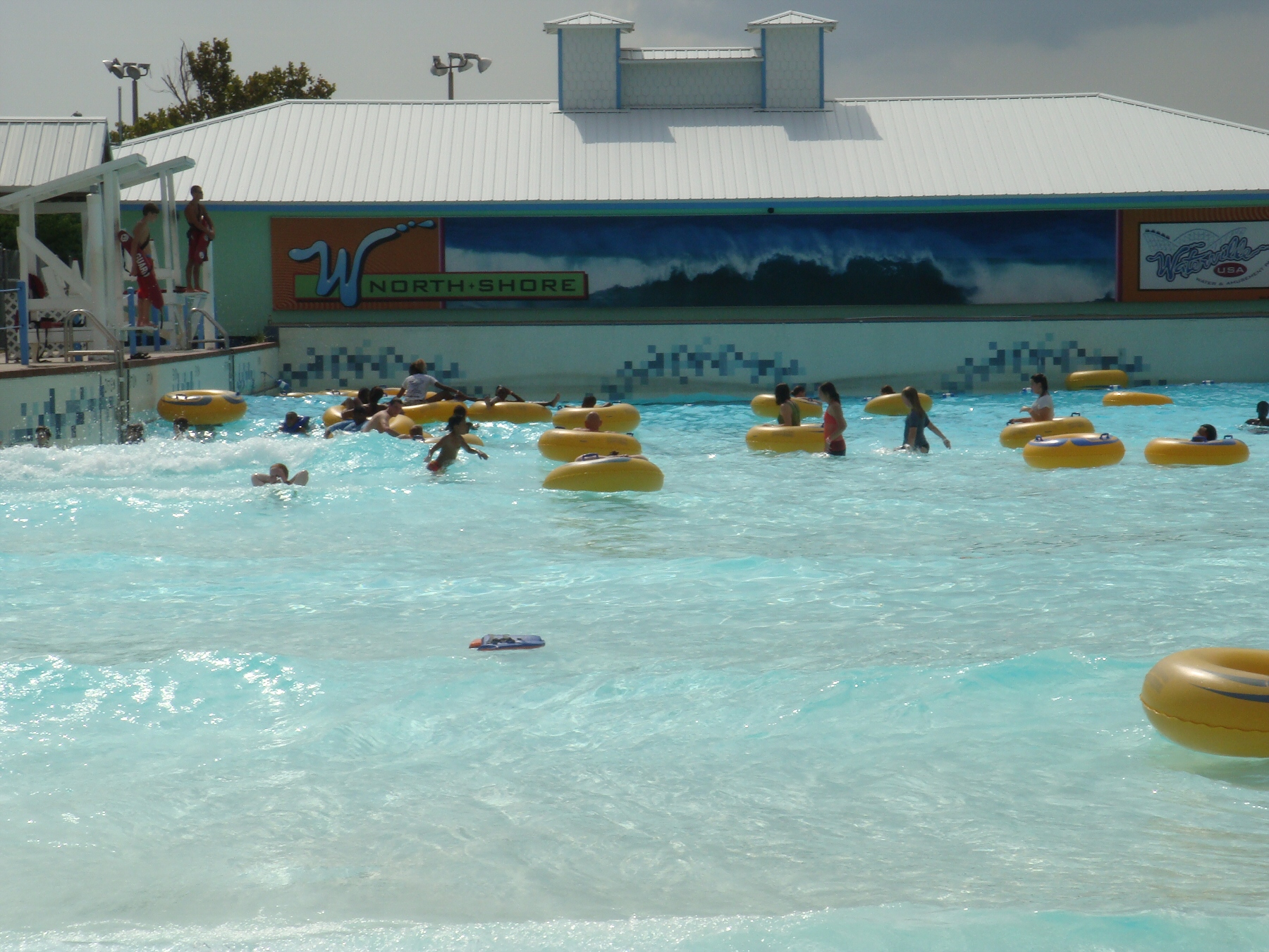 people in wave pool