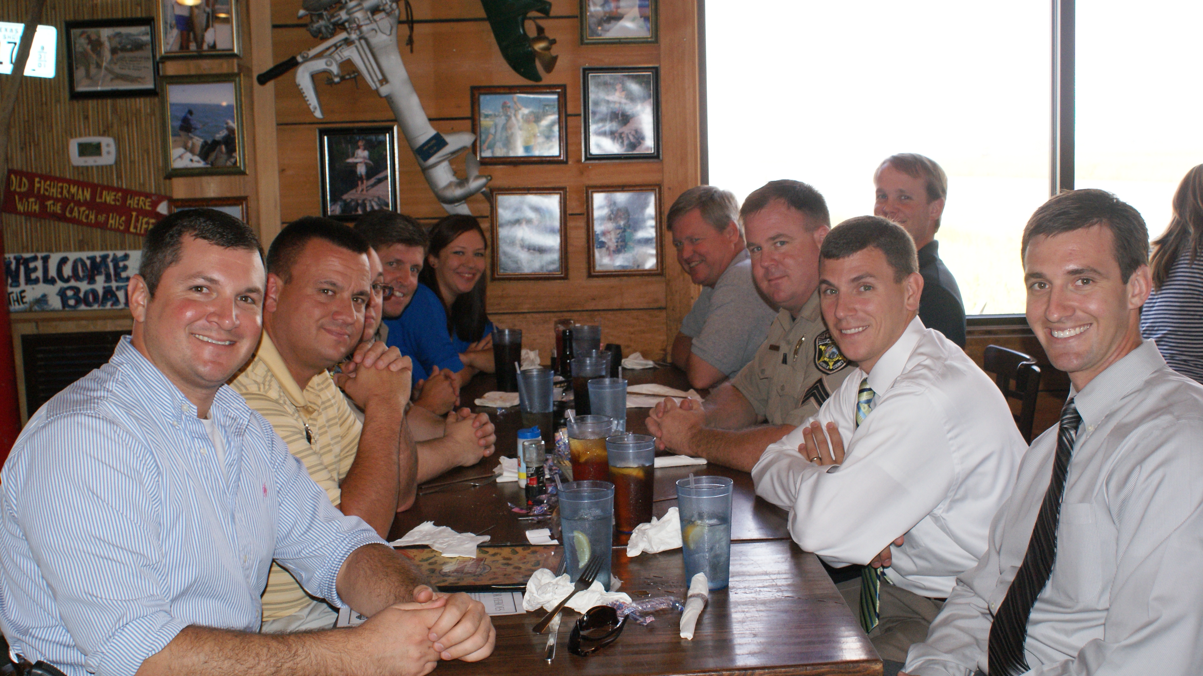 Group of men sitting at Never Forget Lunch at Original Oyster House