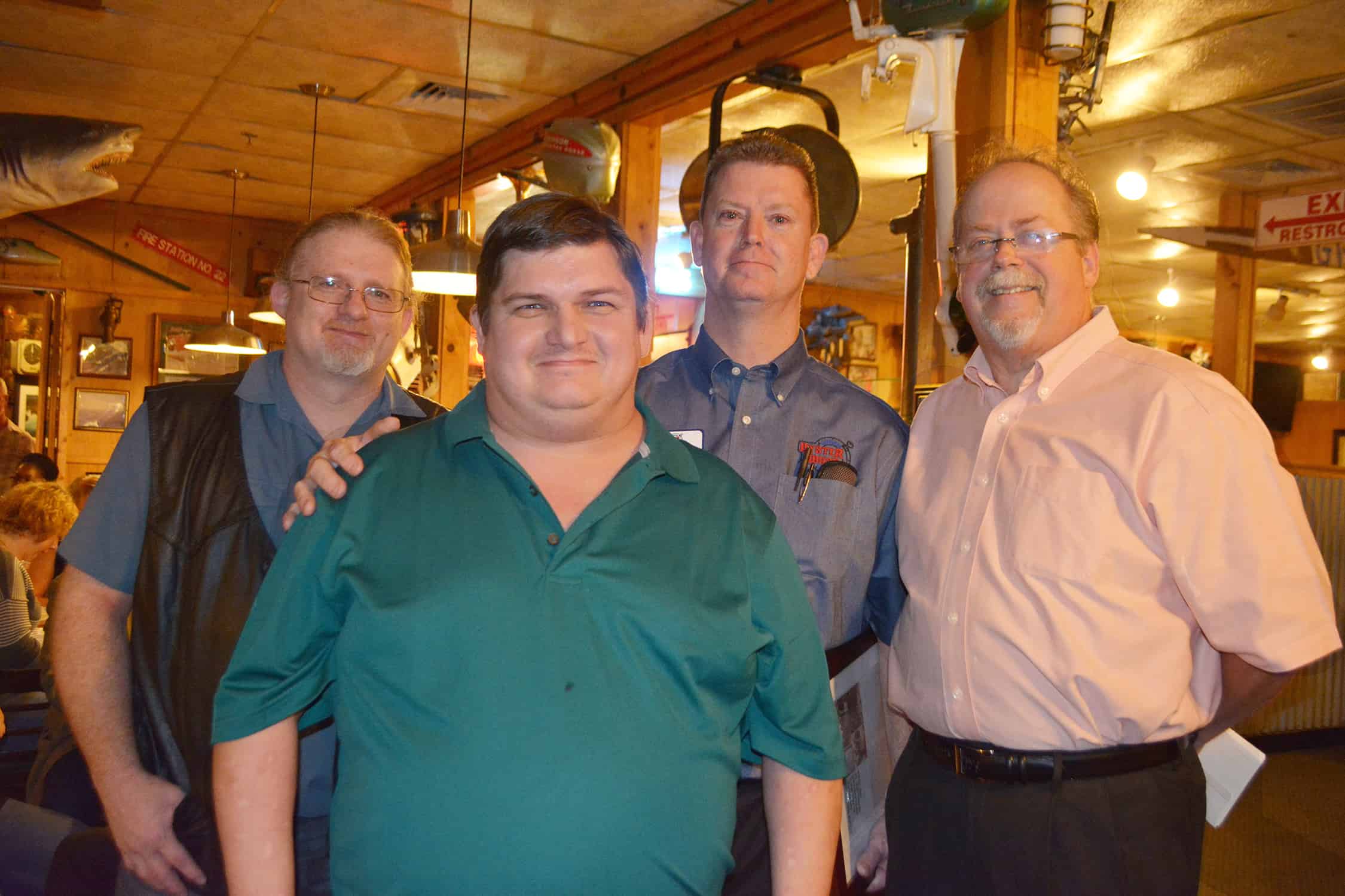 Pictured from left: James Nail, Employee of the Year, Matthew Simmons, Allen Hastings, and Bud Morris.