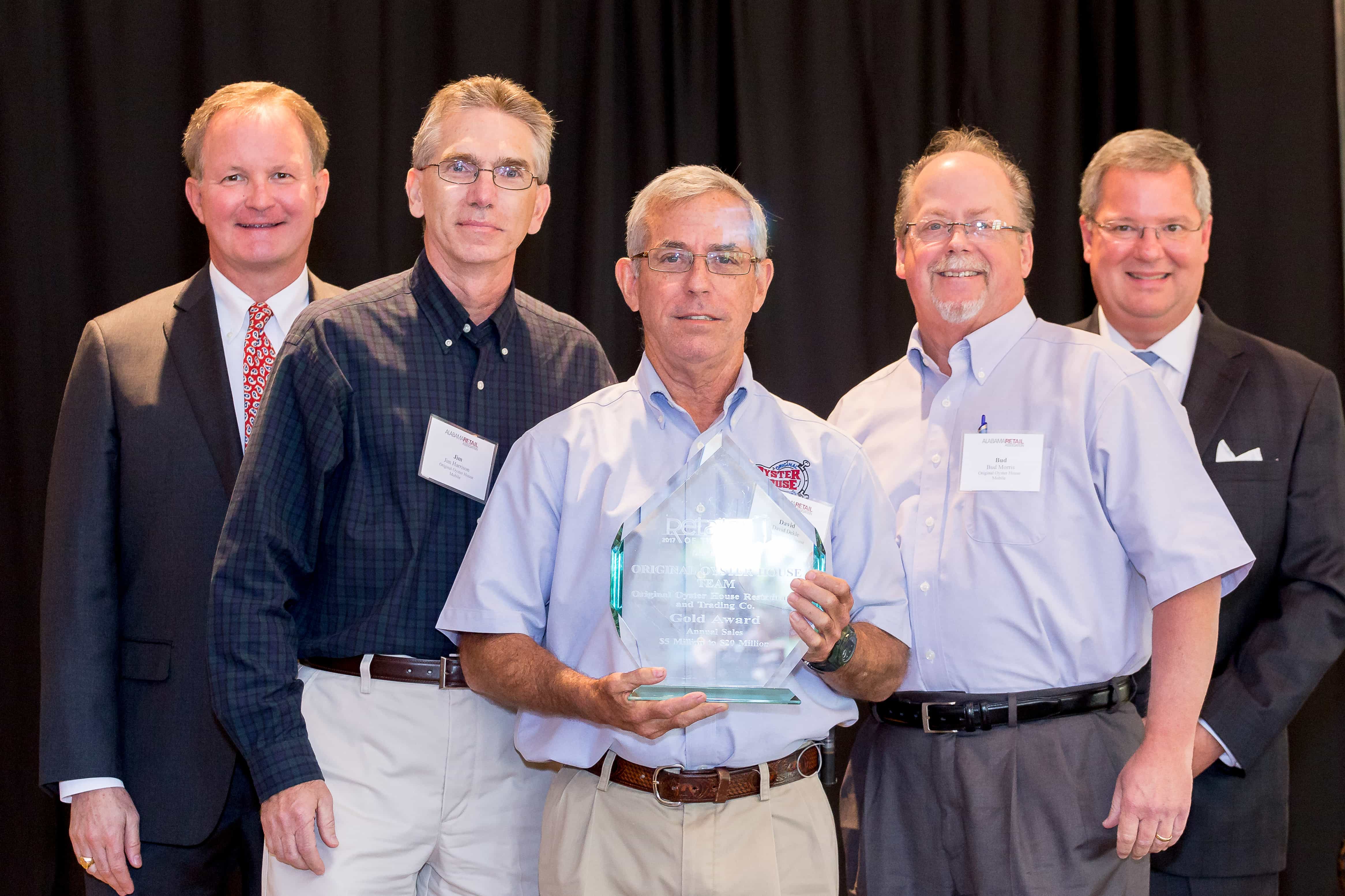 The Original Oyster House Team holding up award