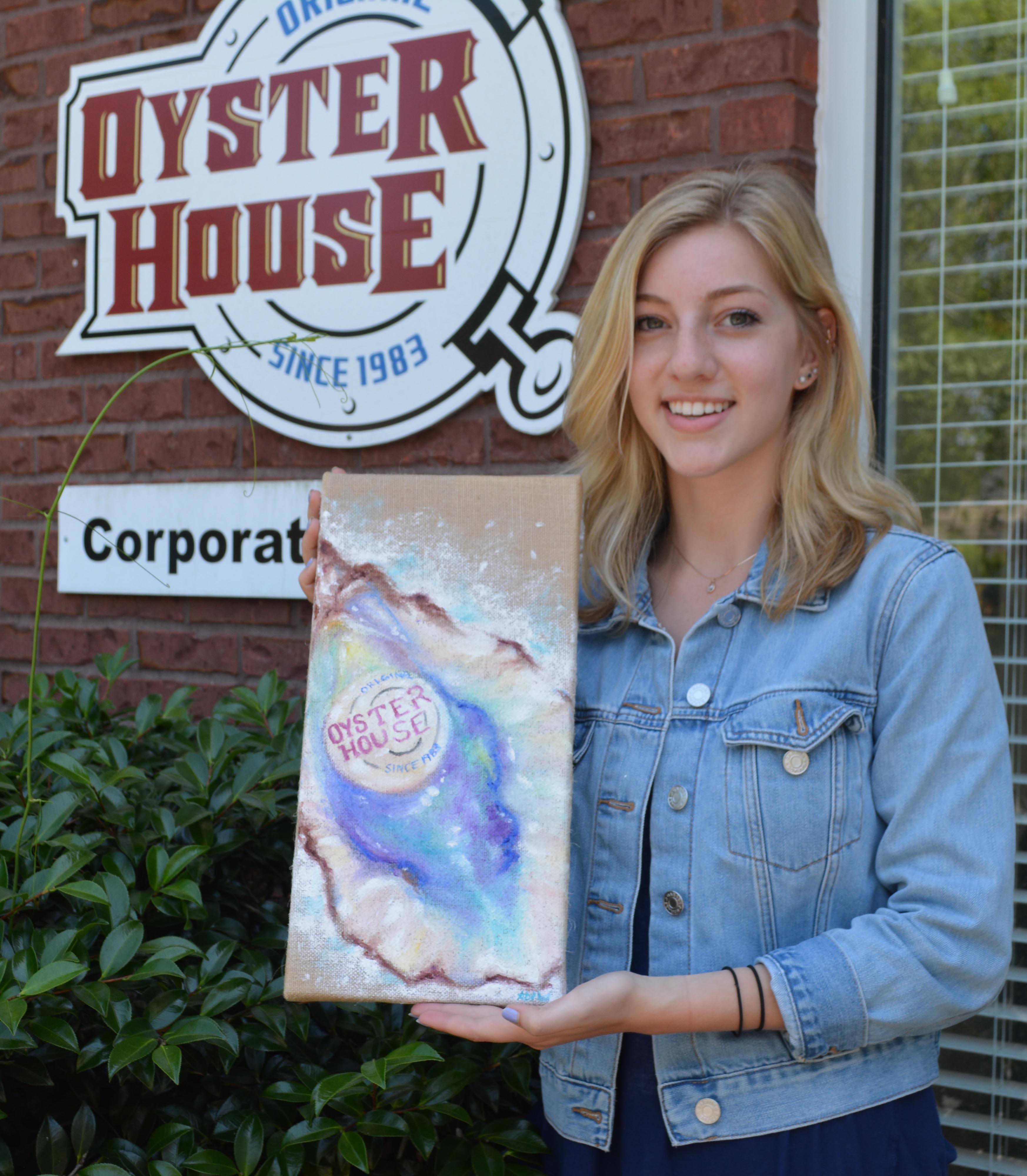 2018 Chelsea Garvin Spirit Scholarship winner Abi Waller pictured holding her artwork