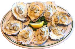 Oysters baked with sliced jalapenos, garlic cream sauce and topped with cheese