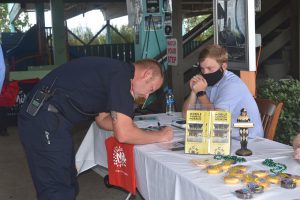 Perdido Queen Dinner Cruises Austin Harler signs up first responders to win a free dinner cruise.