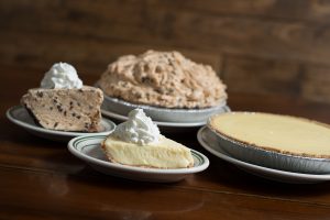 Chocolate Chip Peanut Butter Whole Pie and Key Lime Whole Pie and slices