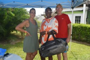 Netta Hooks (center) of the Mobile Causeway Original Oyster House won one of the grand door prizes. She is pictured with from left Joie Sullivan, HR generalist and Jim Harrison, GM of the Mobile Causeway.