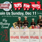Toys for Tots US Marines in front of donations boxes