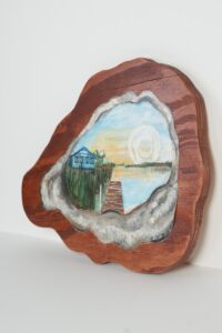 Mary Katherine Crowell's Scholarship winning artwork features the Banquet Room sunset from the Delta side framed in an oyster shell